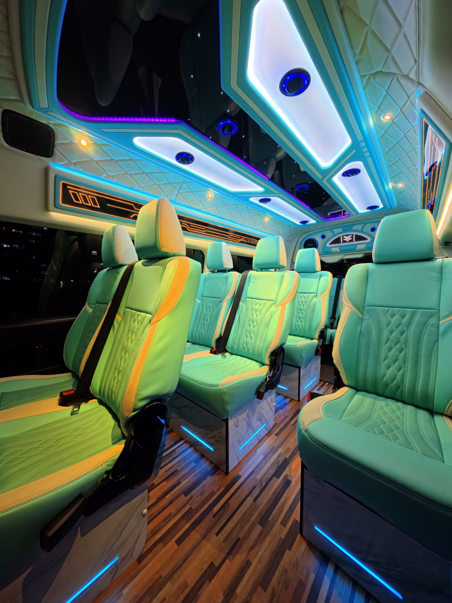 Luxury van interior with premium seating, ambient LED lighting and spacious layout